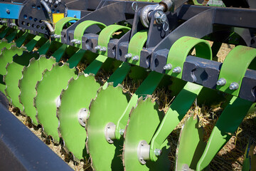 Closeup of a modern disc harrow or plow