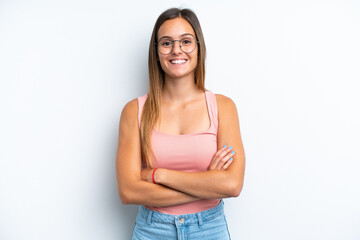 Young caucasian woman isolated on white background keeping the arms crossed in frontal position