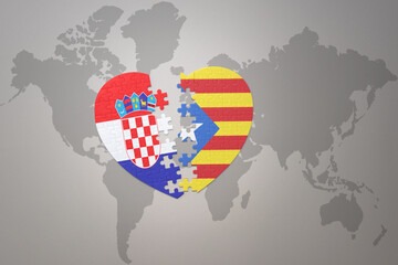 puzzle heart with the national flag of croatia and catalonia on a world map background.Concept.