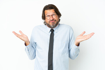 Senior dutch business man isolated on white background having doubts while raising hands