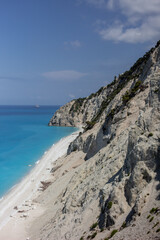 Fototapeta na wymiar cliffs and rocks above the egremni beach in lefkas greece with crystal clear blue waters