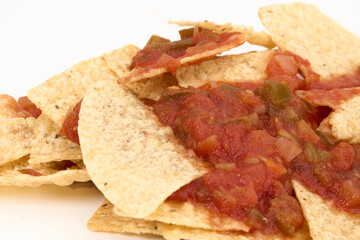 closeup chips and salsa isolated on white background 