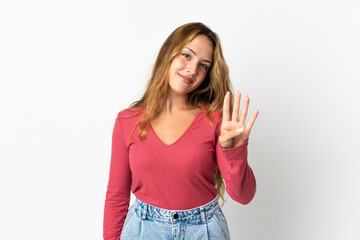 Young blonde woman isolated on blue background happy and counting four with fingers