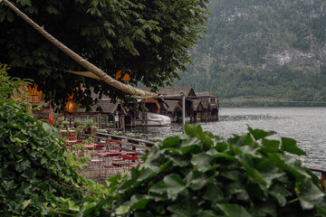 tiny houses above the lake in the hallstatt mountains