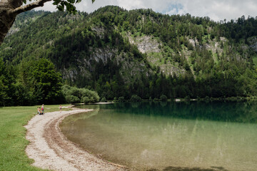 Fototapeta na wymiar lake in the forest under the mountain