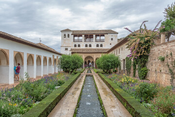Exterior view at the Garden Water Channel, or Patio de la Acequia, on Generalife Gardens, inside at the Alhambra citadel, alcazaba, Granada, Andalusia, Spain
