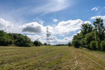 Fototapeta na wymiar landscape with a transmission tower
