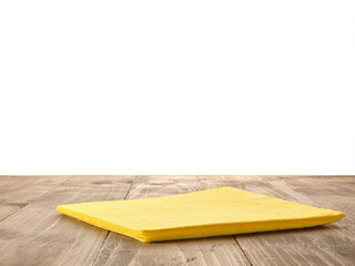Yellow Napkin on kitchen table with isolated background (very large depth of field)
