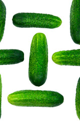 green cucumbers on a white background. ripe gherkins on a table. fresh vegetables on a light texture. the concept of growing cucumbers