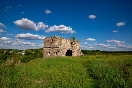 Remains and ruins of an old castle in Europe. UNESCO heritage in the Ukrainian village Sutkivtsi.