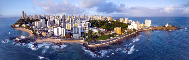 Panorama tip of Salvador with beautiful sunset lighting in a large coastal city with beach, Bahia, Brazil