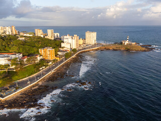 Tip of Salvador with beautiful sunset lighting in a large coastal city with beach, Bahia, Brazil
