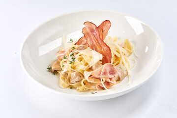 Spaghetti carbonara with bacon and cheese