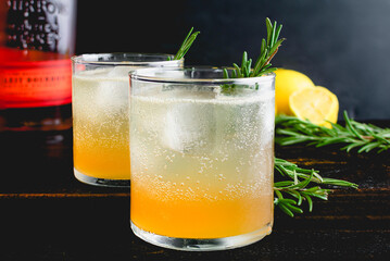 Sparkling Rosemary-Lemon Bourbon Cocktail: American whiskey cocktails served over ice with a rosemary garnish