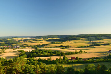 Fototapeta na wymiar landscape in the thuringian Eichsfeld with view to the village Rustungen