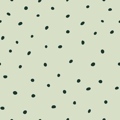 Seamless pattern with green dots. Abstract background. Hand drawn. Polka dot. Texture for print, textile, fabric, wallpaper.