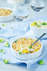 Broccoli corn rice casserole in a white plate