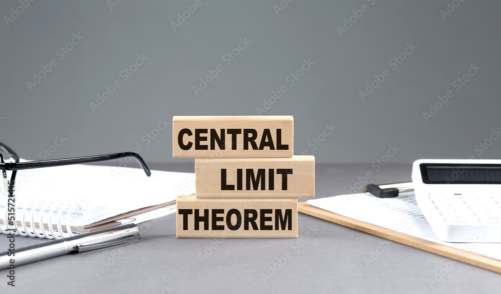 Aufkleber CENTRAL LIMIT THEOREM text on wooden block with notebook,chart and calculator, grey background