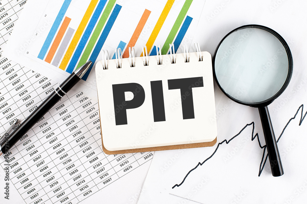 Poster PIT text on notebook on the graph background with pen and magnifier