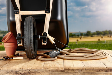 Naklejka premium Workin time and wheelbarrow 