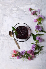 Still life with jam and flowers. View from above