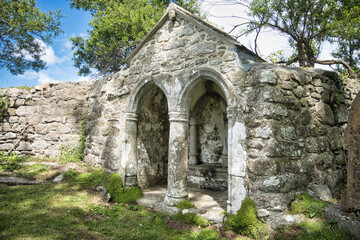 Fototapeta na wymiar Arches in an old stone wall