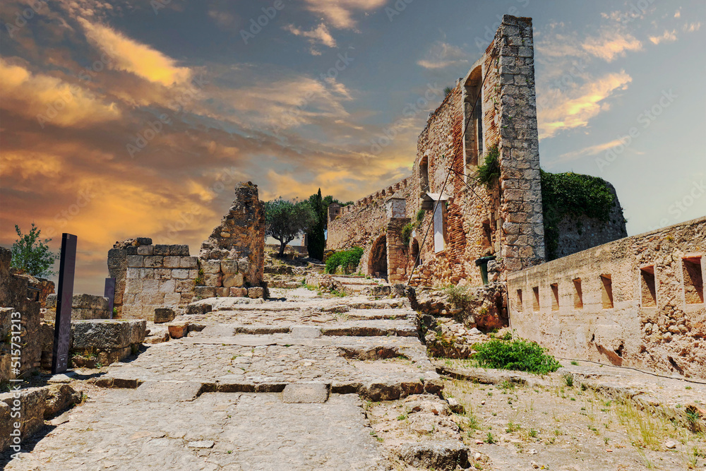 Poster Ruined fortified walls of Xativa castle of Spain during sunset