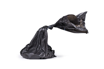Black plastic dog poop bag on white background