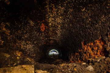 Historical underground red brick passage under old city