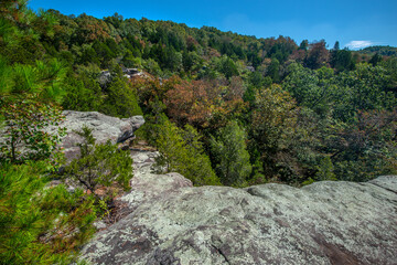 Fototapeta na wymiar Autumn colors from atop a stone mountain landscape.