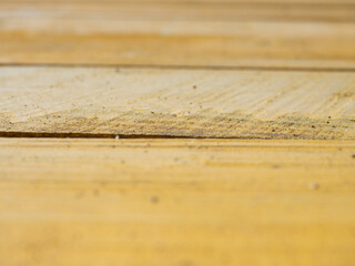 Knocked down fresh boards. Construction works. Plank floor. Fresh wood.  Wood background