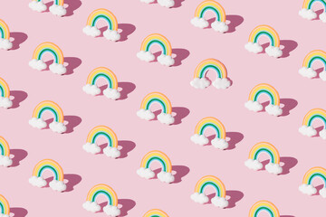 Small colorful rainbow cookie with clouds. Pattern. Copy space.