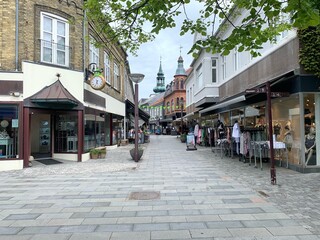 pedestrian zone with shops in the town centre of Lemvig with view to the church tower, Jutland, Denmark