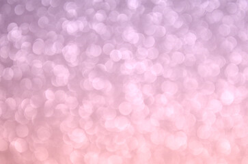 Fondo glitter con efecto bokeh desenfocado de color degradado lila / rosa. Se puede usar como fondo