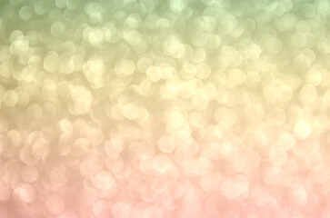Fondo glitter con efecto bokeh desenfocado de color degradado gold rose / rosa / amarillo / verde. Se puede usar como fondo