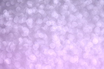 Fondo glitter con efecto bokeh desenfocado de color degradado lila, violeta / rosa. Se puede usar...