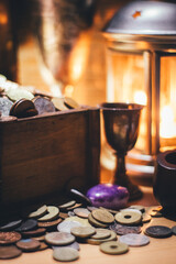 escena de fantasía con copas, pipa, monedas y elementos medievales steampunk