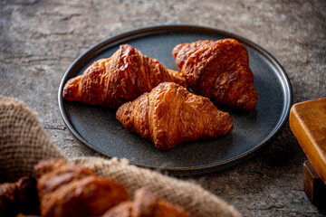 Freshly baked croissants.
Delicious croissants image.