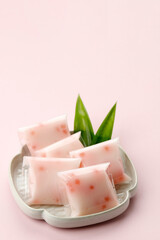 Cantik Manis or Jentik Manis or Kue Pacar Cina, Cente is Indonesian Traditional Dessert made from Mung Bean Flour Hunkwe, Sago Pearl, and Coconut Milk.