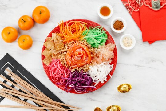 Salmon Yee Sang or Yusheng, a Prosperity Toss Dishfor Chinese New Year Celebration