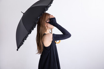 日傘をさす女性　Woman with a parasol