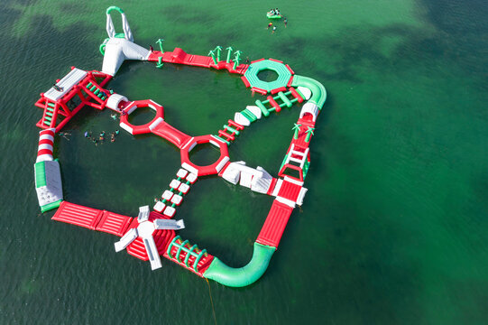 Anda, Pangasinan, Philippines - Aerial of a inflatable water park setup near Tondol Beach.