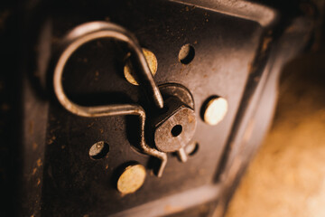 The spring cotter pin holds the axis of the tiller of the walk-behind tractor close-up