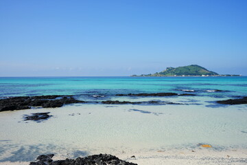clear water and rocks and island