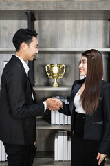 business success concept, Businessman And Businesswoman Shaking Hands. business people handshaking