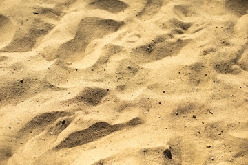 Yellow sand on beach. Texture of sand. Summer background.