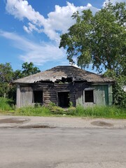 Old abandoned burnt village house