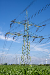 An electricity pylon with power lines seen in Germany