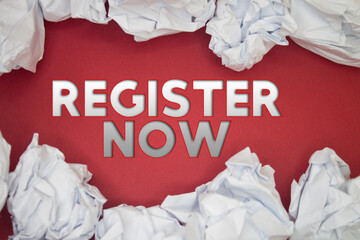 Register Now text with Torn, Crumpled White Paper on colored background.