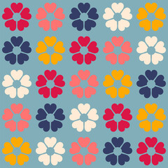 Colorful retro background. Geometric abstract seamless pattern . Vintage stylised flowers, placement by grid. Cheerful floral surface design print in old school 60s, 70s